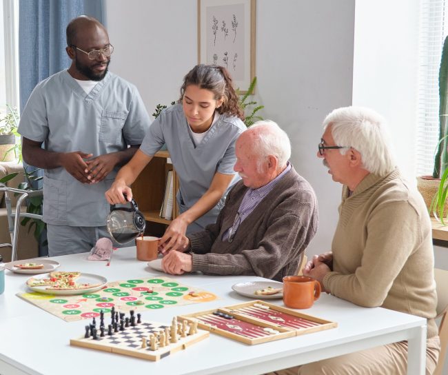Nurse caring about senior people in nursing home