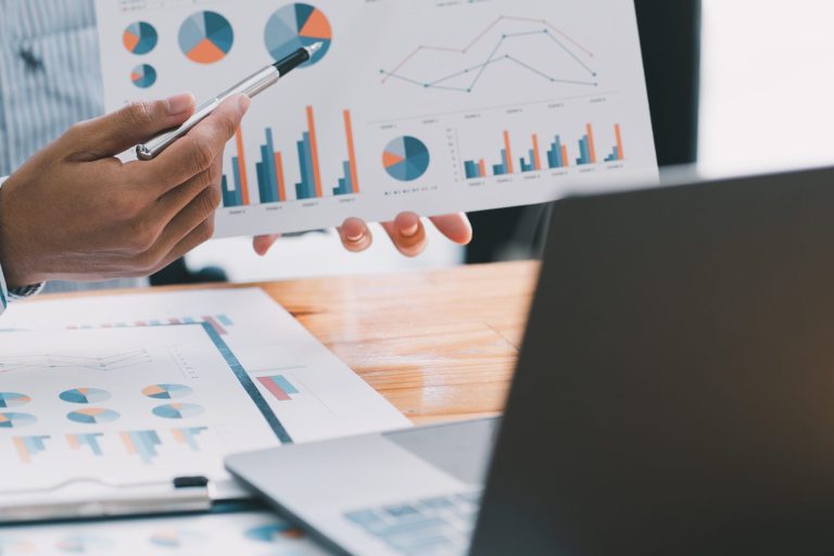 Financial businessman calculating corporate income tax data And