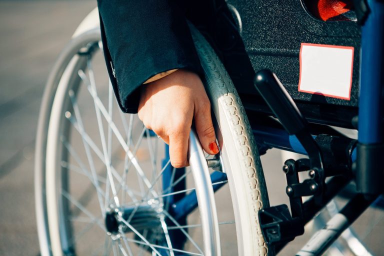 close-up-of-a-female-hand-holding-a-wheelchair-l-2025-02-12-00-51-34-utc-min Rosewood Case Study | VCare