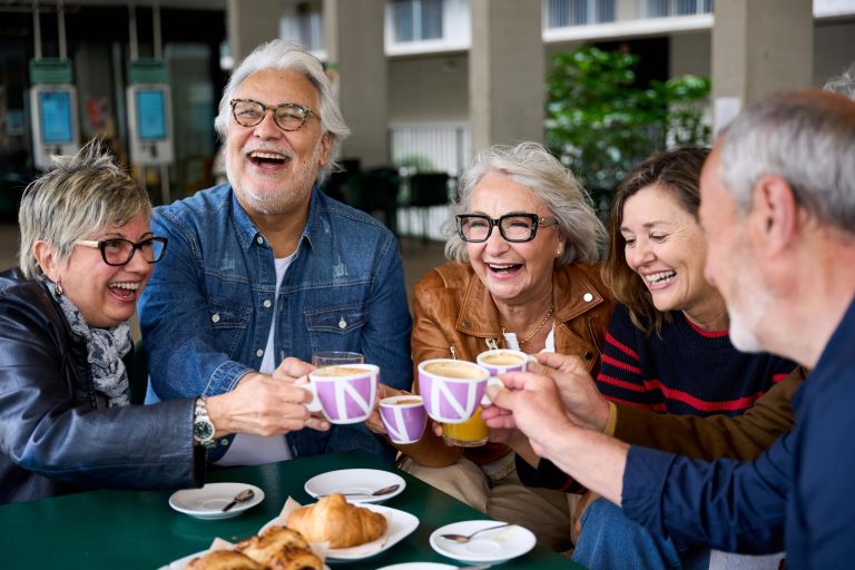older-friends-toasting-with-coffee-cups-gathered-t-2025-08-10-05-44-47-utc-min VCare integrated software for continuum of care in retirement villages